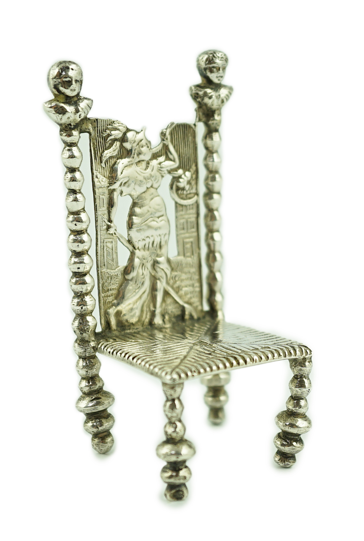 A late 19th century Dutch silver miniature model of a high back chair, import marks for B.H. Joseph & Co